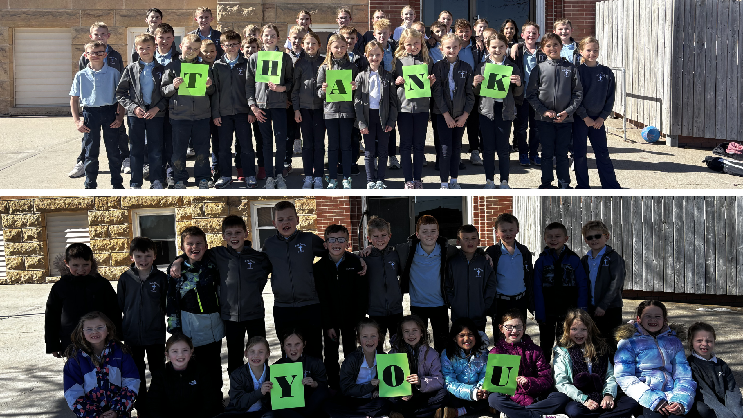 Large group of students outdoors, holding green letter cards that spell 'THANK YOU'.